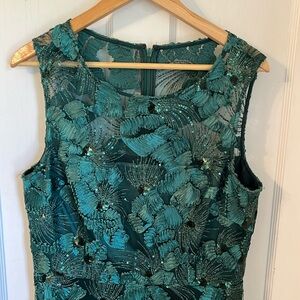 Alex Marie Dark Green Sleeveless sequin dress with green liner.